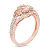 Thumbnail Image 1 of Oval Morganite and 1/3 CT. T.W. Diamond Three Stone Ring in 10K Rose Gold