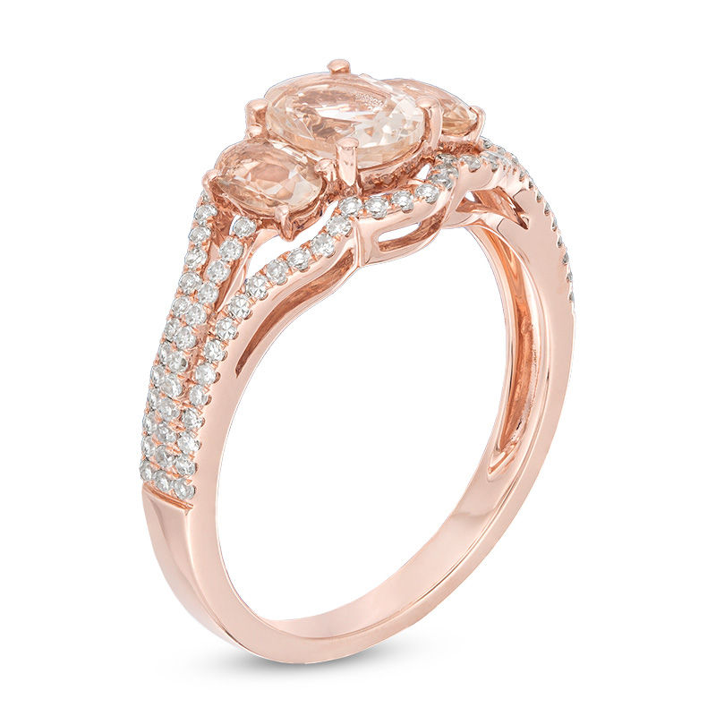 Oval Morganite and 1/3 CT. T.W. Diamond Three Stone Ring in 10K Rose Gold
