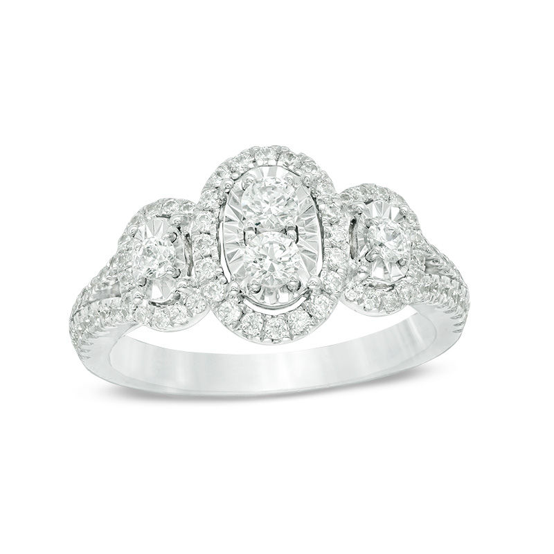 Main Image 1 of 3/4 CT. T.W. Diamond Three Stone Oval Frame Engagement Ring in 14K White Gold