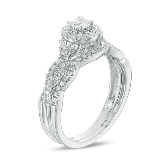 1/2 CT. T.w. Diamond Frame Twist Bridal Set in 10K White Gold