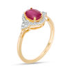 Thumbnail Image 1 of Oval Ruby and 1/6 CT. T.W. Diamond Frame Tri-Sides Ring in 10K Gold