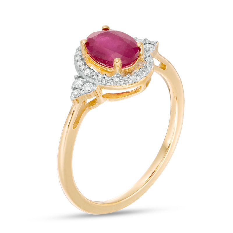 Oval Ruby and 1/6 CT. T.W. Diamond Frame Tri-Sides Ring in 10K Gold