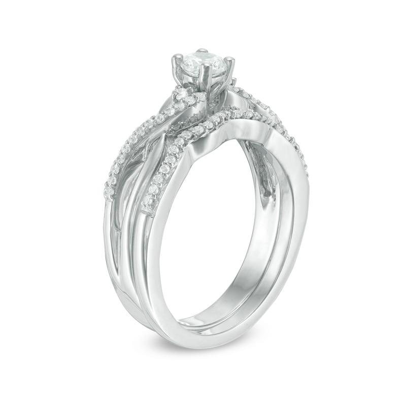 Main Image 2 of 1/3 CT. T.W. Diamond Three Stone Twist Bridal Set in Sterling Silver