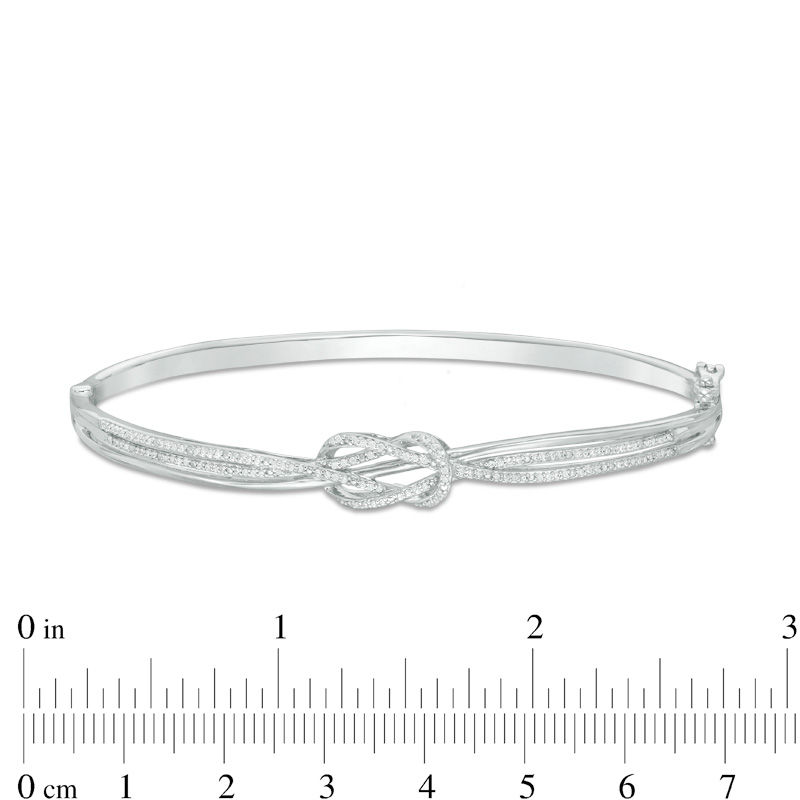 1/4 CT. T.W. Diamond Bypass Double Loop Knot Bangle in Sterling Silver - 7.5"