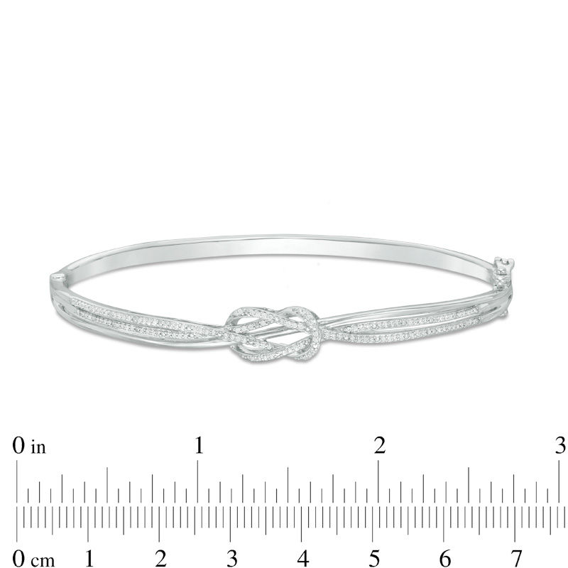 Main Image 2 of 1/4 CT. T.W. Diamond Bypass Double Loop Knot Bangle in Sterling Silver - 7.5"