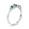 Thumbnail Image 1 of Marquise Emerald and 1/6 CT. T.W. Diamond Seven Stone Illusion Anniversary Ring in 14K White Gold