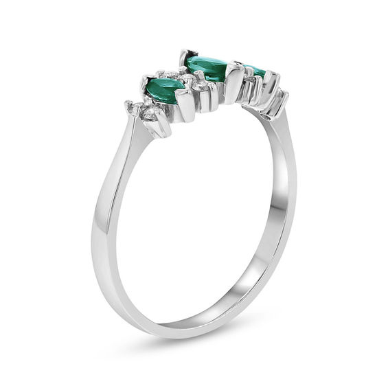 Marquise Emerald and 1/6 CT. T.w. Diamond Seven Stone Illusion Anniversary Ring in 14K White Gold