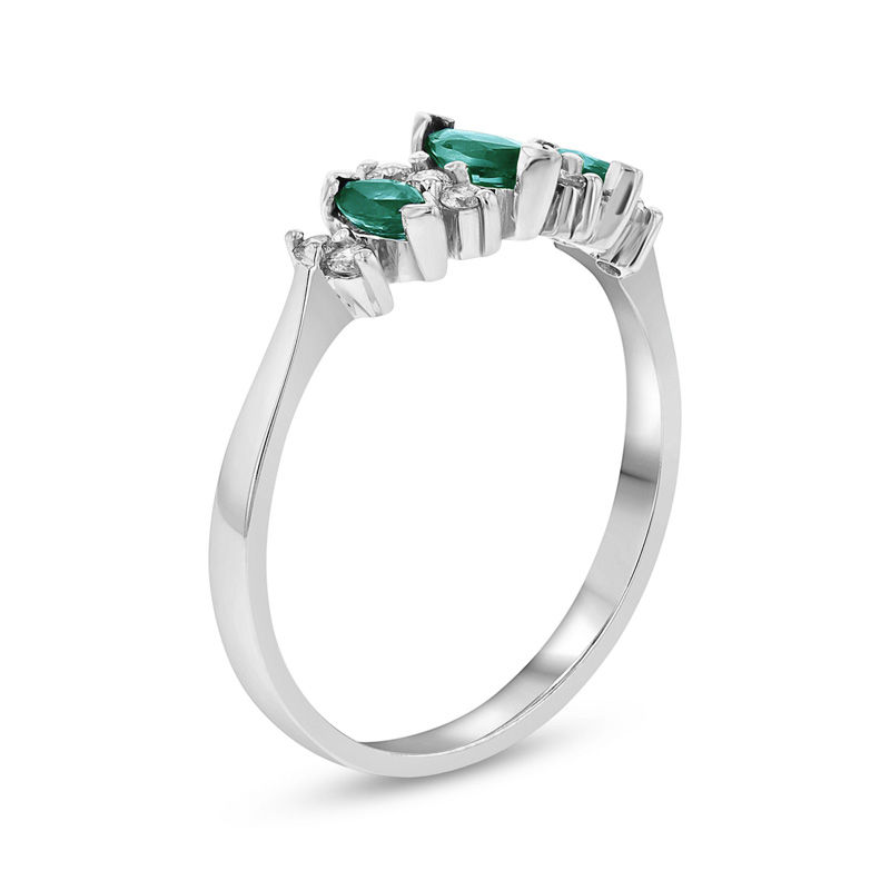 Marquise Emerald and 1/6 CT. T.W. Diamond Seven Stone Illusion Anniversary Ring in 14K White Gold