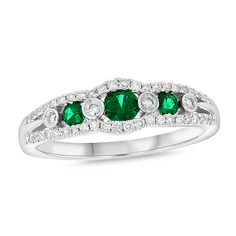 Emerald and 1/4 CT. T.W. Diamond Seven Stone Anniversary Ring in 14K White Gold