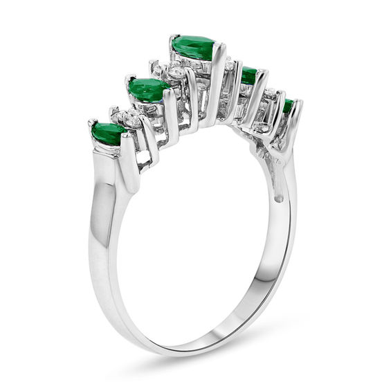 Marquise Emerald and 1/8 CT. T.w. Diamond Nine Stone Illusion Ring in 14K White Gold