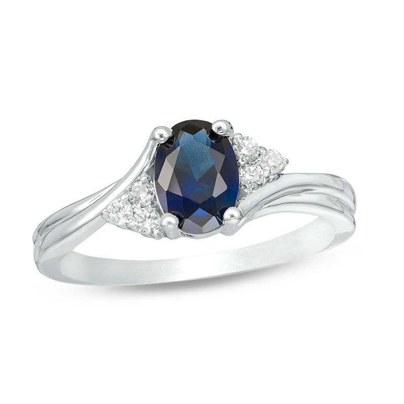 Main Image 1 of Oval Lab-Created Blue Sapphire and 1/10 CT. T.W. Diamond Tri-Sides Promise Ring in 10K White Gold