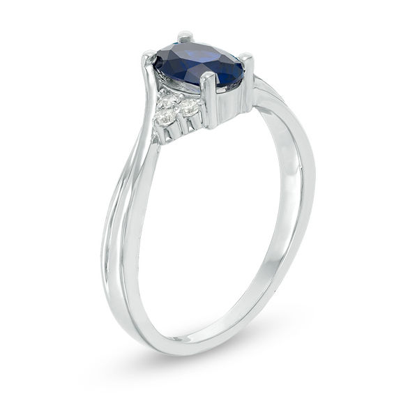 Oval Lab-Created Blue Sapphire and 1/10 CT. T.w. Diamond Tri-Sides Promise Ring in 10K White Gold