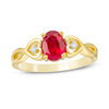 Thumbnail Image 0 of Oval Lab-Created Ruby and Diamond Accent Heart Sides Promise Ring in 10K Gold