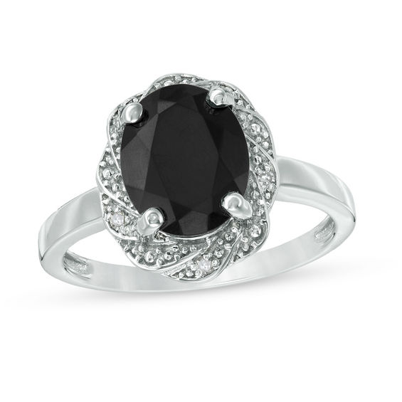 Oval Onyx and Diamond Accent Pinwheel Frame Ring in Sterling Silver