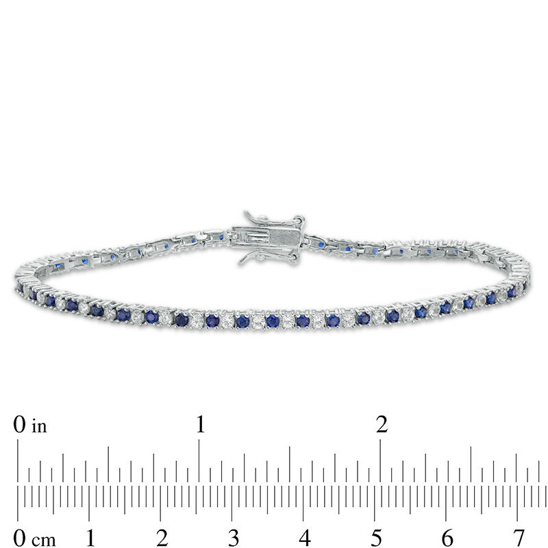 Main Image 3 of Lab-Created Blue and White Sapphire Tennis Bracelet in Sterling Silver - 7.25"