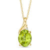 Thumbnail Image 0 of Oval Peridot and Diamond Accent Swirl Top Pendant in 10K Gold