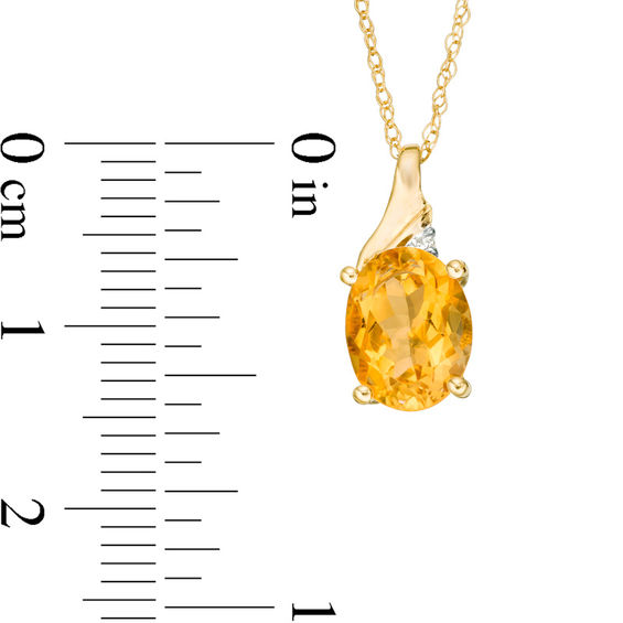 Oval Citrine and Diamond Accent Swirl Top Pendant in 10K Gold