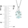 Thumbnail Image 1 of Oval Aquamarine and Diamond Accent Swirl Top Pendant in 10K White Gold