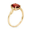 Thumbnail Image 1 of Oval Garnet and Diamond Accent Bypass Swirl Shank Ring in 10K Gold