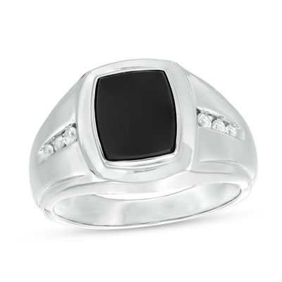 Wide silver ring set with a shiny Onyx shiny dented