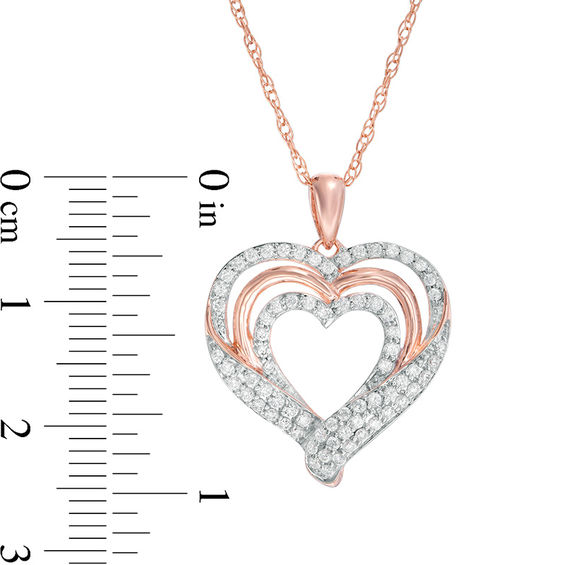 1/2 CT. T.w. Diamond Triple Heart Pendant in Sterling Silver with 14K Rose Gold Plate