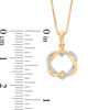 Thumbnail Image 1 of 1/20 CT. T.W. Diamond Inverted Interlocking Hearts Pendant in Sterling Silver with 18K Gold Plate