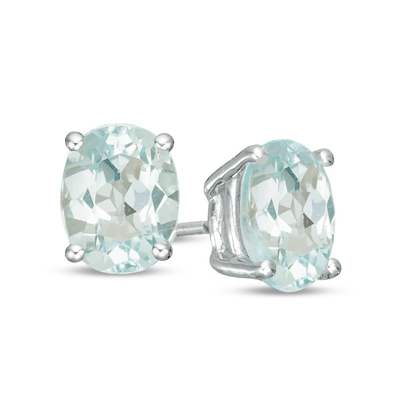 Main Image 1 of Oval Blue Topaz Solitaire Stud Earrings in Sterling Silver