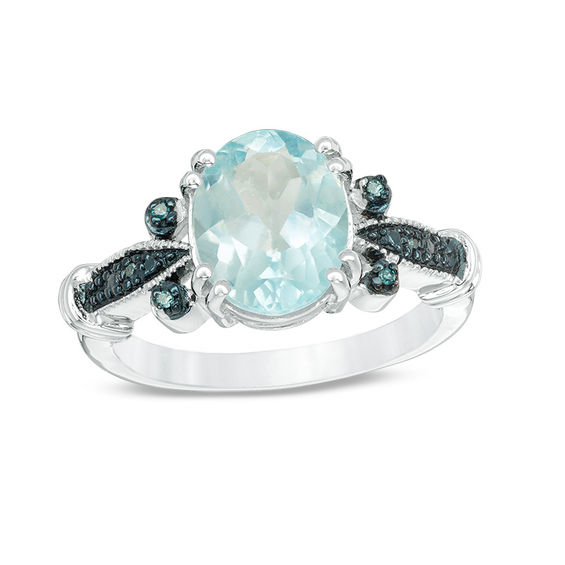 Oval Blue Topaz and Enhanced Blue Diamond Accent Vintage-Style Collared Ring in Sterling Silver Oval Blue Topaz and Enhanced Blue Diamond Accent Vintage-Style Collared Ring in Sterling Silver