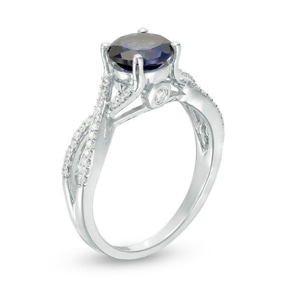 7.0mm Lab-Created Blue Sapphire and 1/6 CT. T.w. Diamond Twist Shank Engagement Ring in 10K White Gold