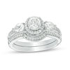 Thumbnail Image 1 of 5.0mm Lab-Created White Sapphire and 1/6 CT. T.W. Diamond Frame Bridal Set in Sterling Silver