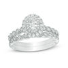 Thumbnail Image 1 of 3/4 CT. T.W. Oval Diamond Double Frame Twist Vintage-Style Bridal Set in 14K White Gold