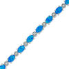 Thumbnail Image 0 of Oval Simulated Blue Opal and Lab-Created White Sapphire Tennis Bracelet in Sterling Silver - 7.5"