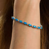 Thumbnail Image 2 of Oval Simulated Blue Opal and Lab-Created White Sapphire Tennis Bracelet in Sterling Silver - 7.5"