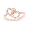 Thumbnail Image 1 of 1/15 CT. T.W. Diamond Interlocking Hearts Ring in 10K Rose Gold