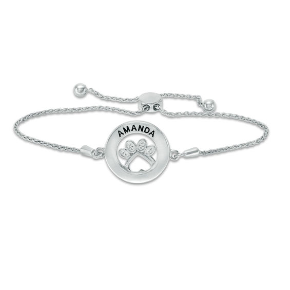 1/15 CT. T.W. Diamond Open Circle with Paw Print Bolo Bracelet in Sterling Silver and 10K Rose Gold (1 Line) - 9.5" 1/15 CT. T.W. Diamond Open Circle with Paw Print Bolo Bracelet in Sterling Silver and 10K Rose Gold (1 Line) - 9.5"