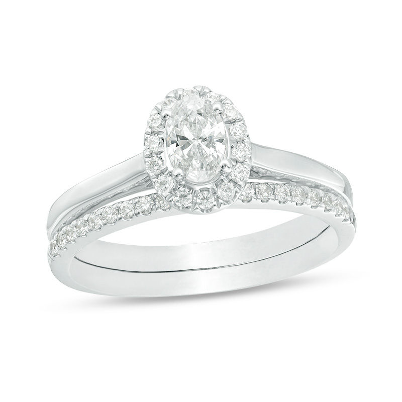 Main Image 1 of 3/4 CT. T.W. Oval Diamond Frame Bridal Set in 14K White Gold