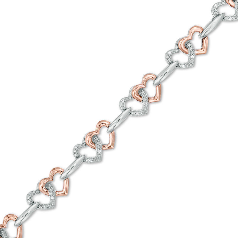 Main Image 1 of 1/10 CT. T.W. Diamond Interlocking Hearts Bracelet in Sterling Silver and 10K Rose Gold - 7.25"