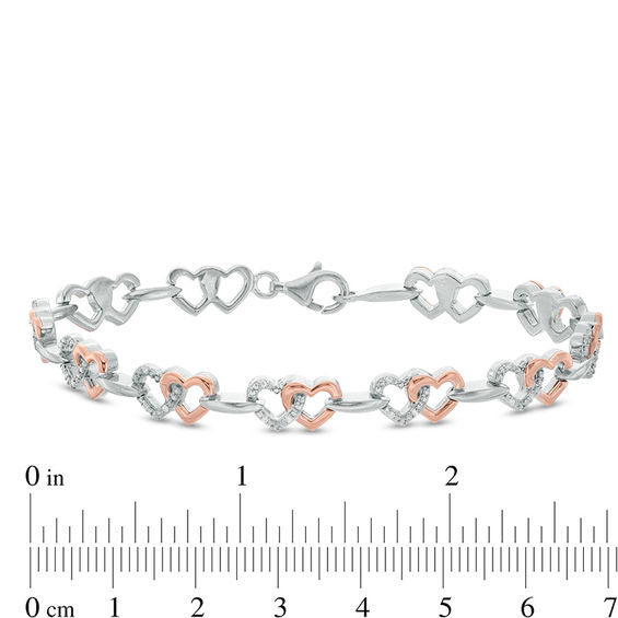 1/10 CT. T.w. Diamond Interlocking Hearts Bracelet in Sterling Silver and 10K Rose Gold - 7.25"