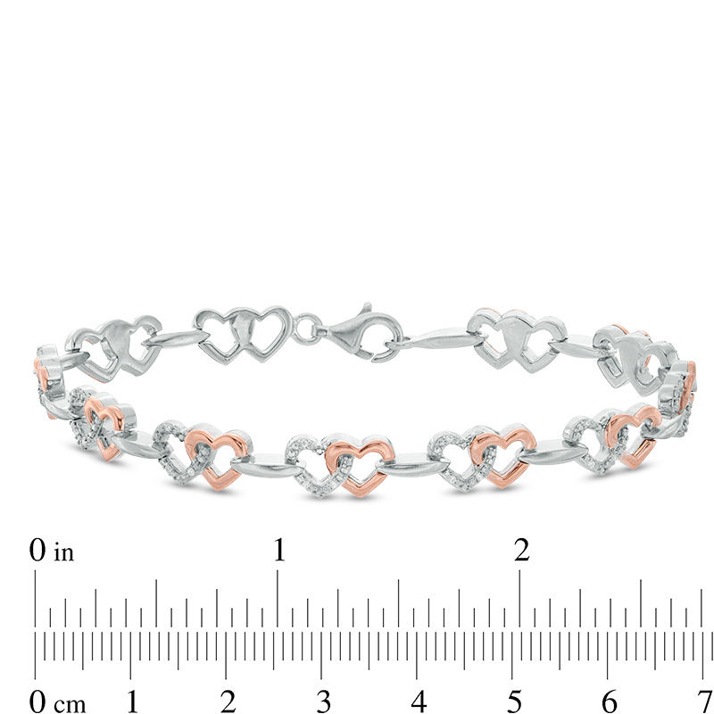 Main Image 3 of 1/10 CT. T.W. Diamond Interlocking Hearts Bracelet in Sterling Silver and 10K Rose Gold - 7.25"