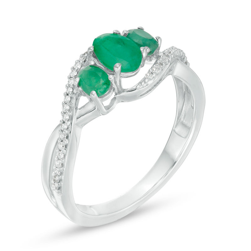 Main Image 2 of Oval Emerald and 1/10 CT. T.W. Diamond Three Stone Crossover Bypass Ring in 10K White Gold
