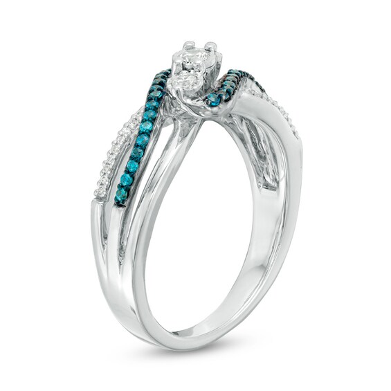 1/3 CT. T.w. Enhanced Blue and White Diamond Three Stone Bypass Ring in Sterling Silver