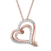 Thumbnail Image 0 of 1/4 CT. T.W. Diamond Tilted Double Heart Pendant in 10K Rose Gold