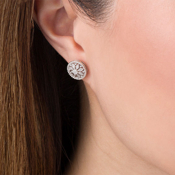 1/10 CT. T.w. Diamond Flower Stud Earrings in Sterling Silver