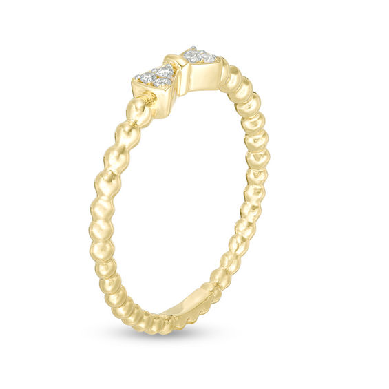 1/20 CT. T.w. Diamond Bow Beaded Shank Ring in 10K Gold