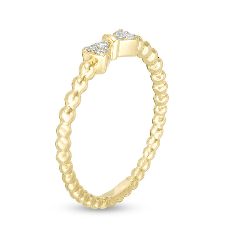 Main Image 2 of 1/20 CT. T.W. Diamond Bow Beaded Shank Ring in 10K Gold