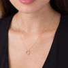Thumbnail Image 2 of 1/4 CT. T.W. Diamond Oval Outline Pendant in 10K Gold