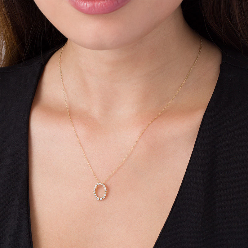Main Image 2 of 1/4 CT. T.W. Diamond Oval Outline Pendant in 10K Gold