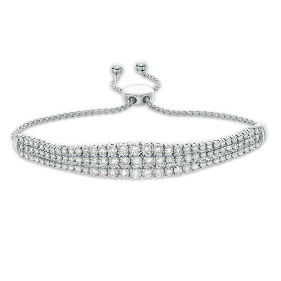 3 CT. T.W. Diamond Graduated Three Row Bolo Bracelet in 10K White Gold - 9.5" 3 CT. T.W. Diamond Graduated Three Row Bolo Bracelet in 10K White Gold - 9.5"