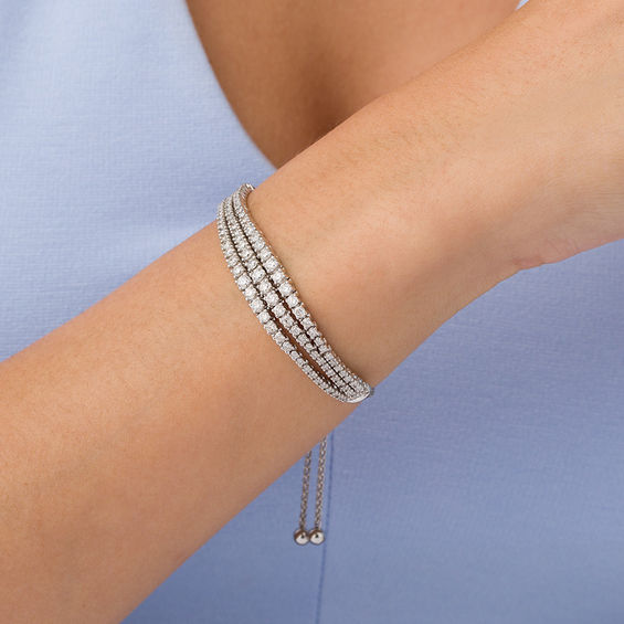 3 CT. T.W. Diamond Graduated Three Row Bolo Bracelet in 10K White Gold - 9.5" 3 CT. T.W. Diamond Graduated Three Row Bolo Bracelet in 10K White Gold - 9.5"