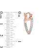 Thumbnail Image 1 of Diamond Accent Solitaire Inside-Out Heart Hoop Earrings in Sterling Silver and 18K Rose Gold Plate